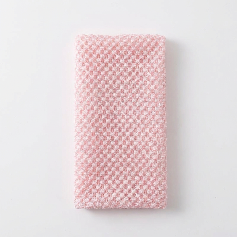 SilkeScrub™ – Exfolierande badhandduk för silkeslen hud.